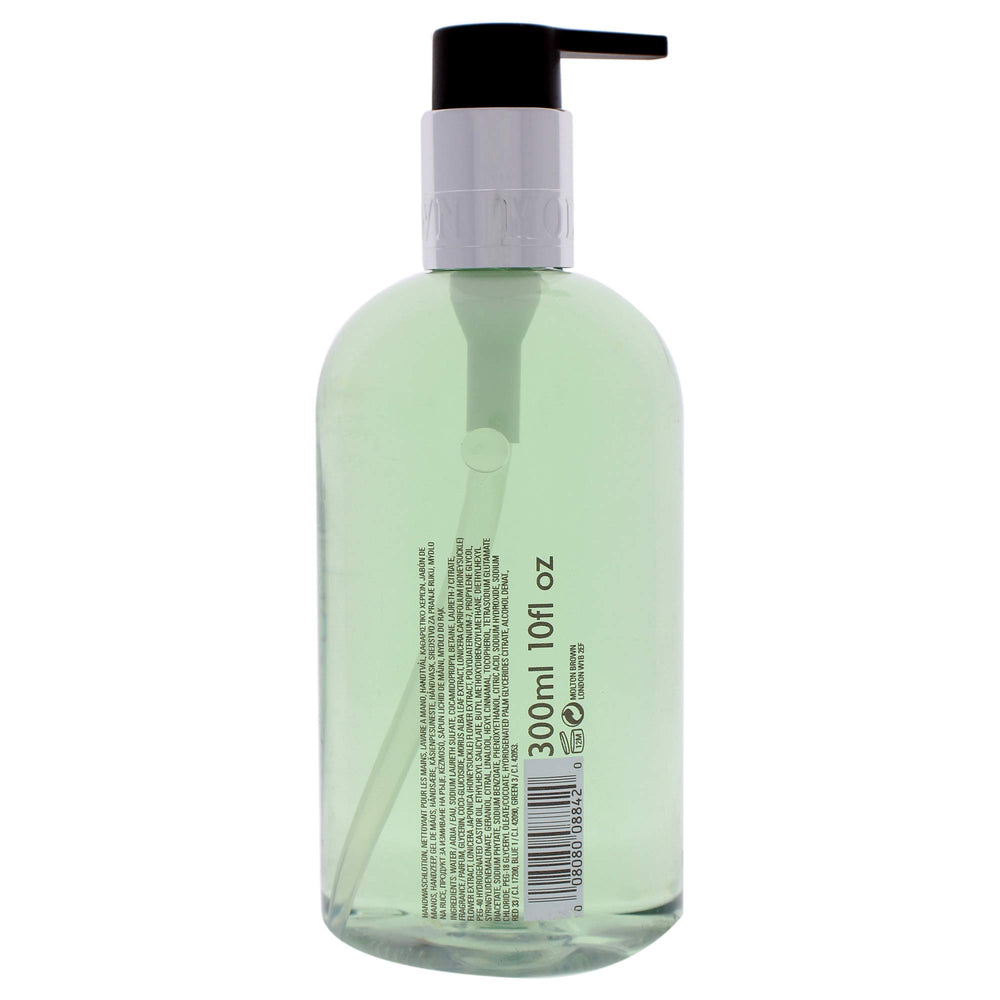 Molton Brown Refined White Mulberry label closeup shows vegan, paraben-free formula.