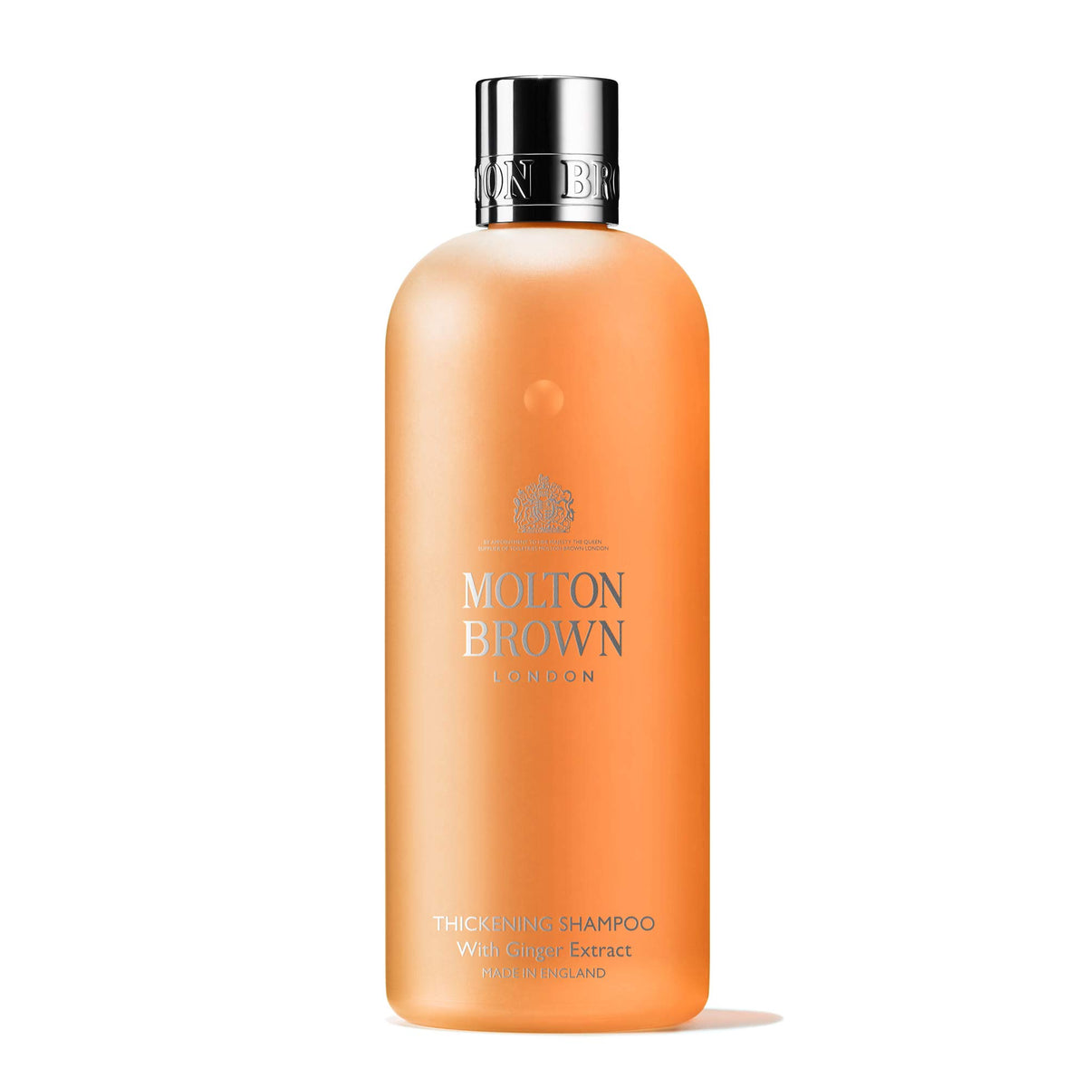 Molton Brown Thickening Shampoo bottle with ginger extract for volumizing effect
