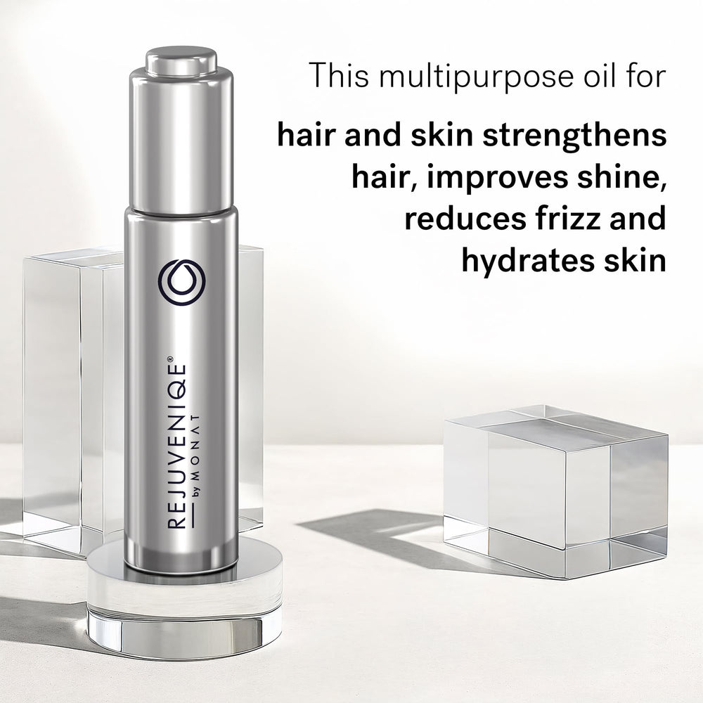 Close-up of REJUVENIQE oil ingredients, a 13-oil blend.