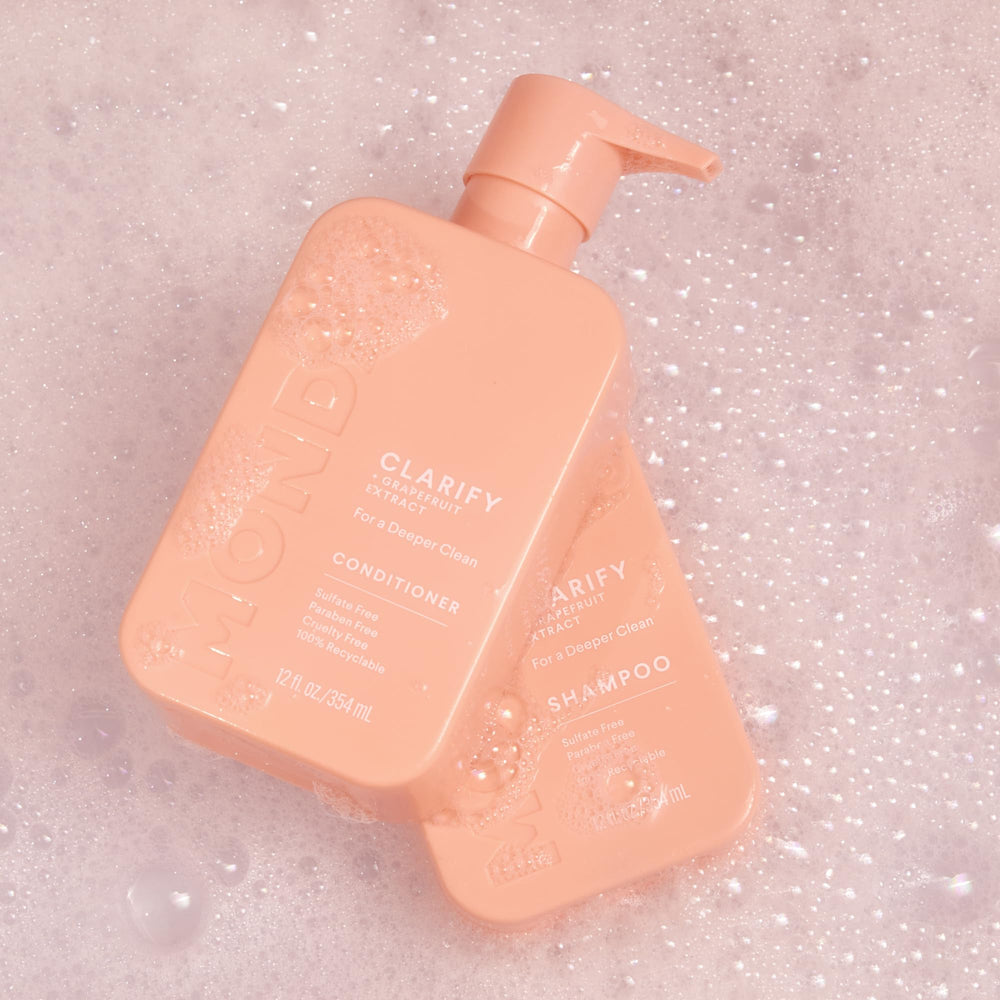 MONDAY Haircare CLARIFY recyclable bottle emphasizes sustainable packaging.