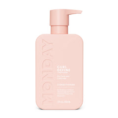 MONDAY Haircare CURL DEFINE bottle on display showing the hydrating formula.