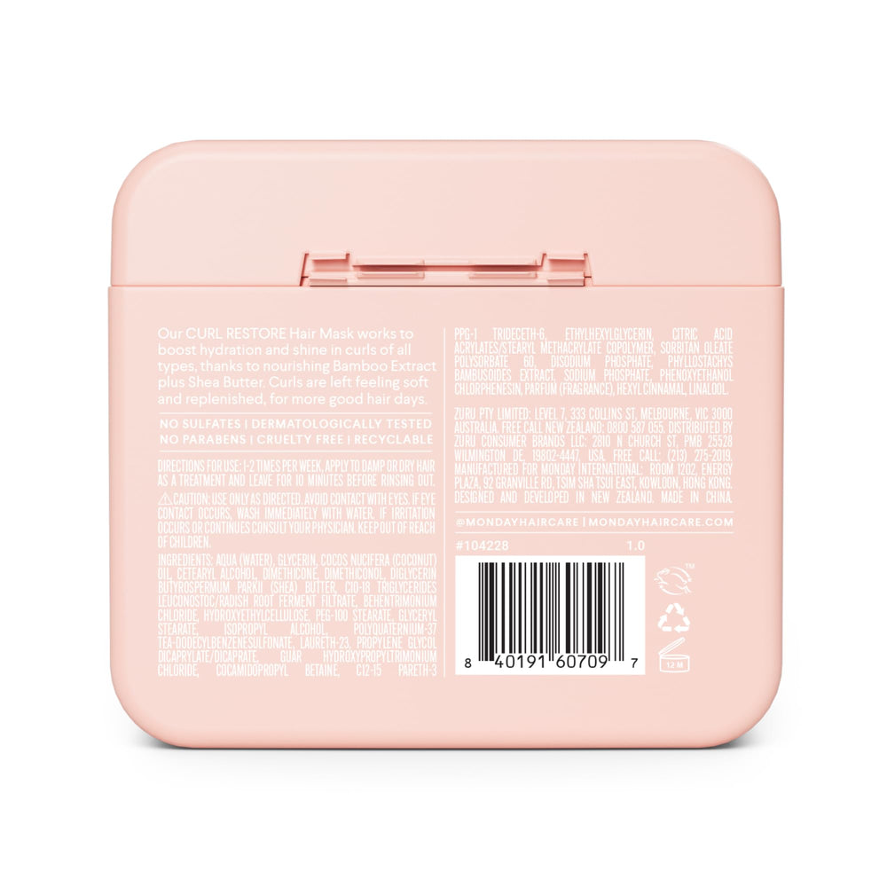 MONDAY Haircare Curl Restore coconut oil formula smooths and softens curly coils.