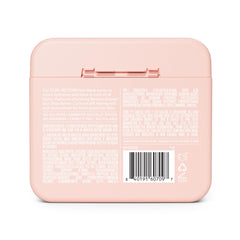 MONDAY Haircare Curl Restore coconut oil formula smooths and softens curly coils.