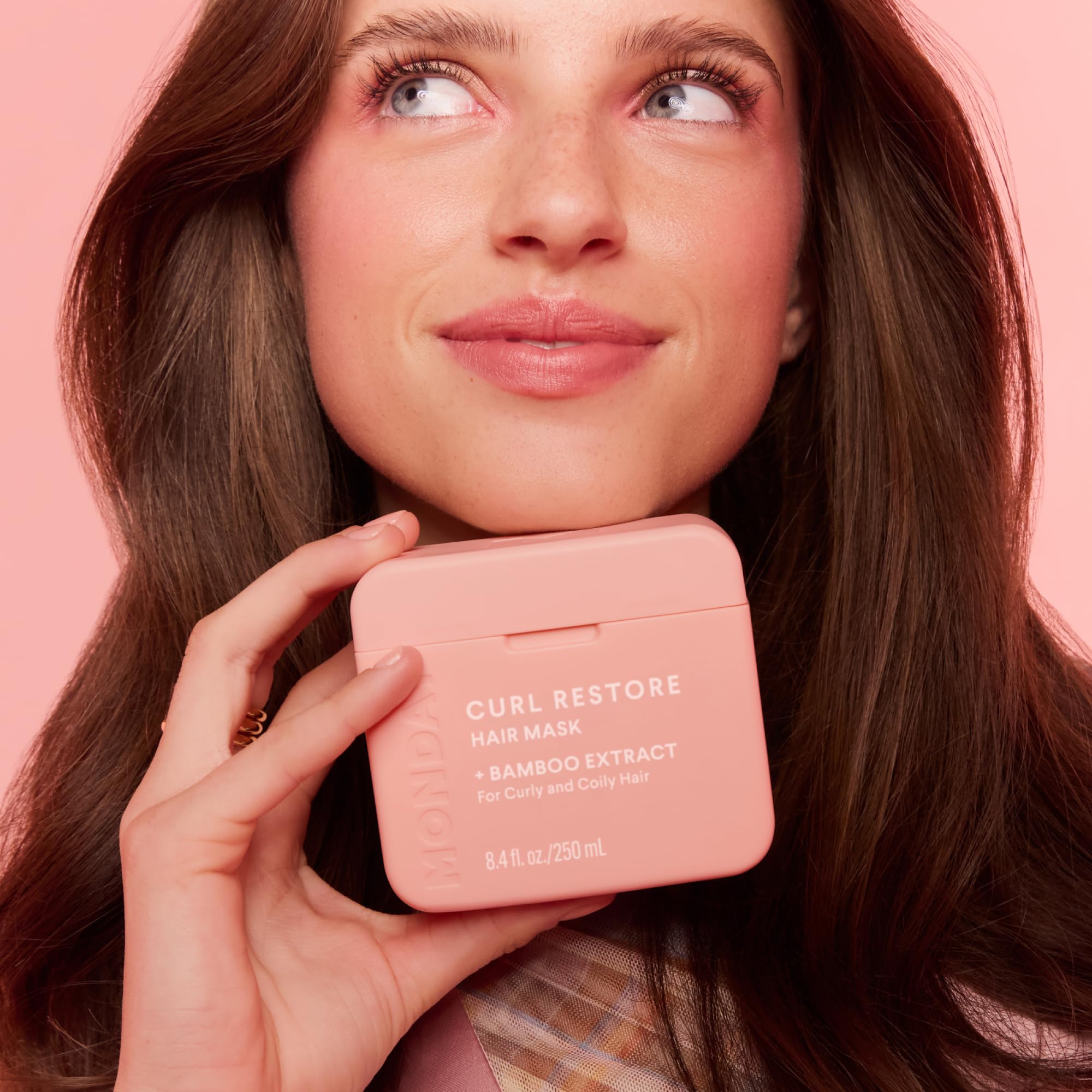 MONDAY Haircare Curl Restore 250 ml bottle showcases premium, dermatologist-tested hair care.