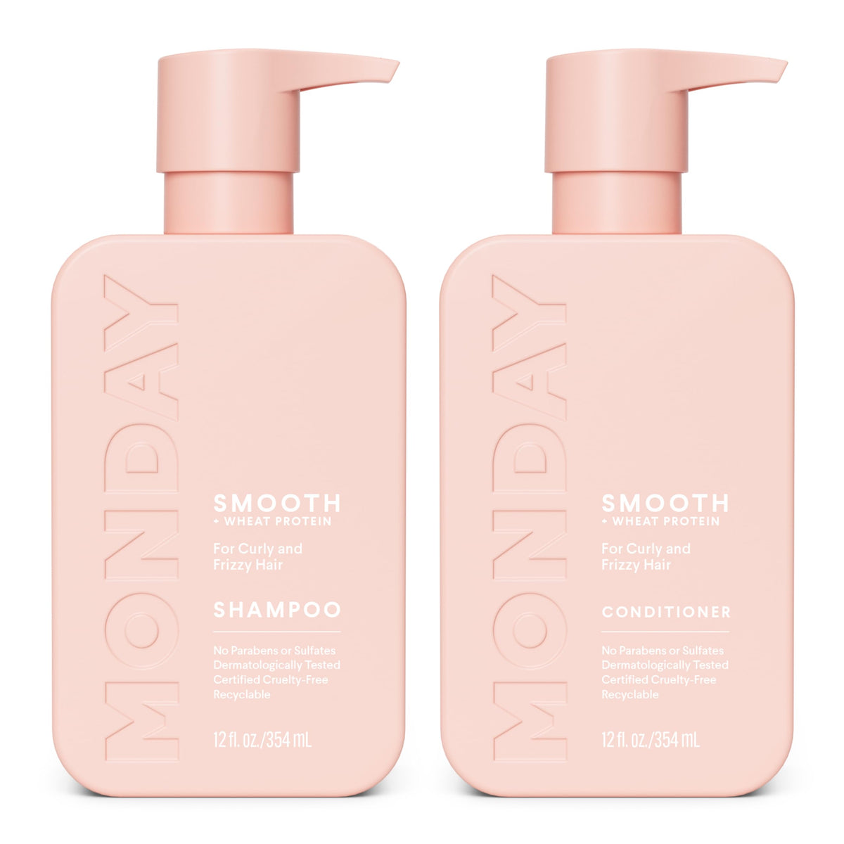 MONDAY HAIRCARE Smooth champú en botella rosa para cabello rizado.