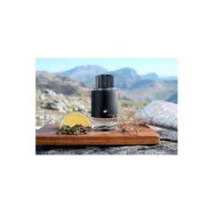 Montblanc Explorer bottle near bergamot note, capturing citrus brightness for daytime wear.