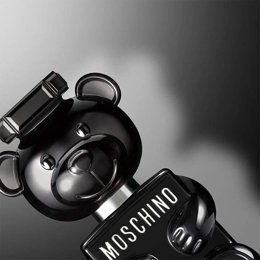 Moschino Toy Boy bear emblem on the label signals iconic branding.