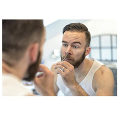 Motanar grooming scissors in hand for beard and eyebrow trims