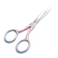 Motanar grooming scissors held in hand illustrating portable at-home use.