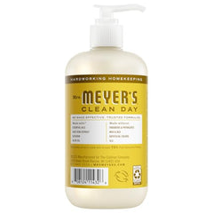 Daisy label close-up on the Mrs. Meyer’s bottle highlights garden scent and cruelty-free design.