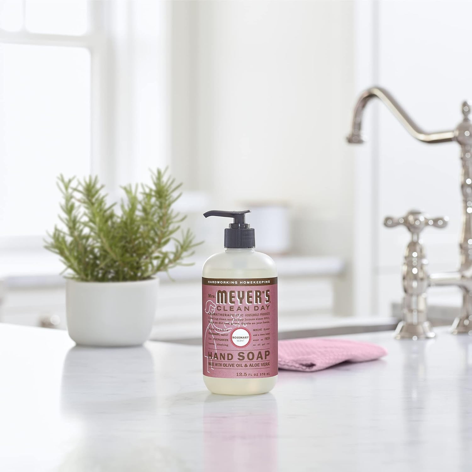 Mrs. Meyer's Clean Day hand soap front label features plant-derived formula for gentle cleansing.