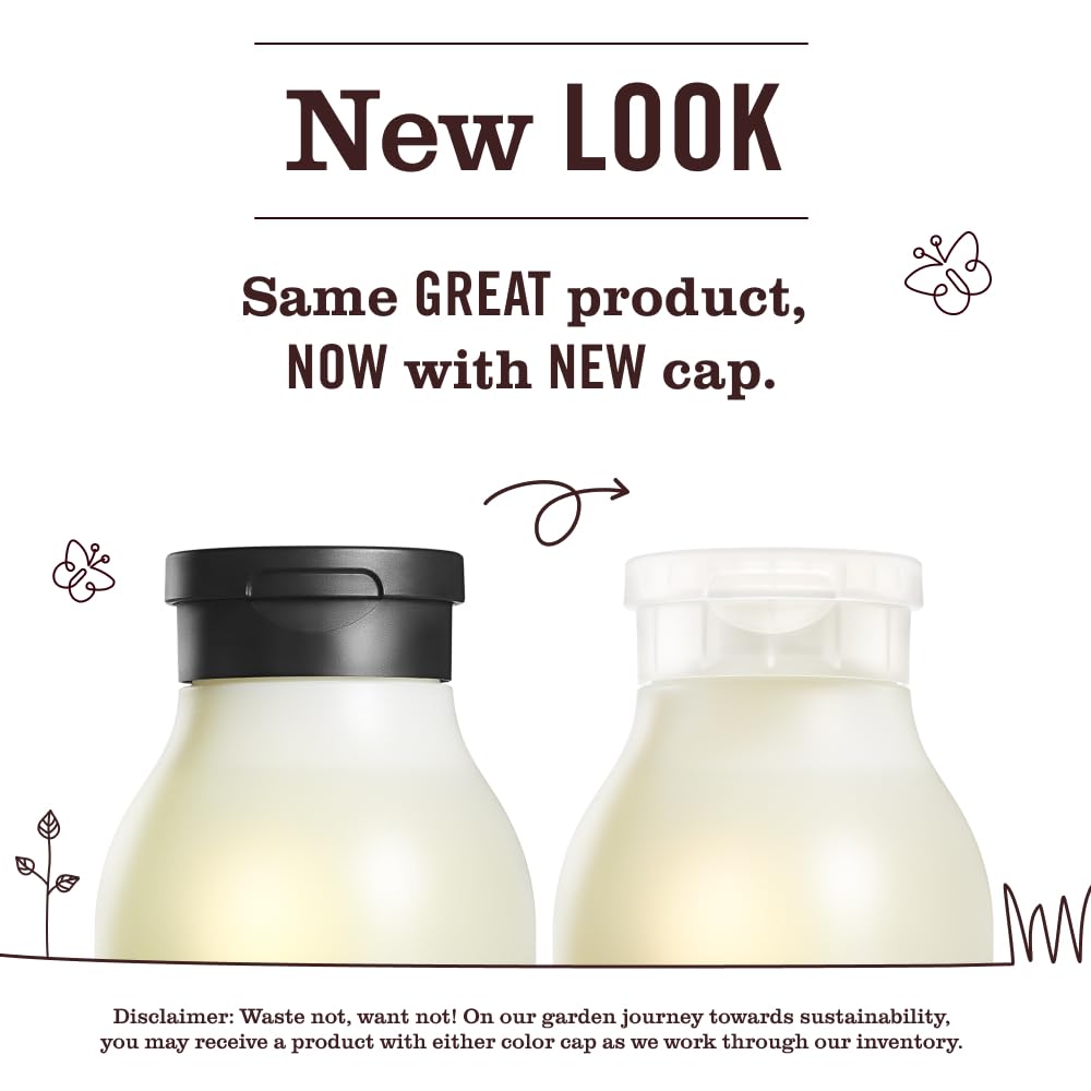 Mrs. Meyer's Clean Day Lavender hand soap bottle emits calming scent for gentle cleansing.
