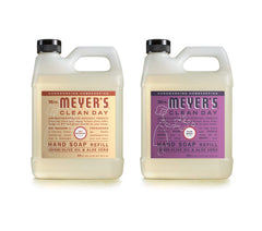 Mrs. Meyer's Clean Day Oat Blossom refill bottle close-up showing soothing aloe and olive oil.
