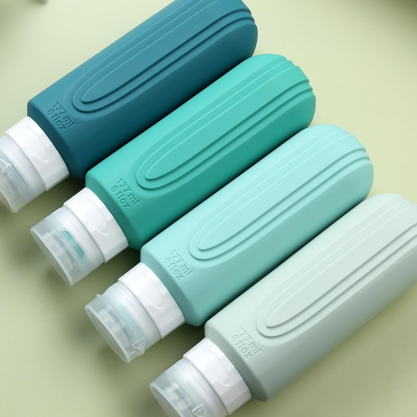 Mrsdry 4-pack travel bottles ideal for shampoo, lotion, and conditioner