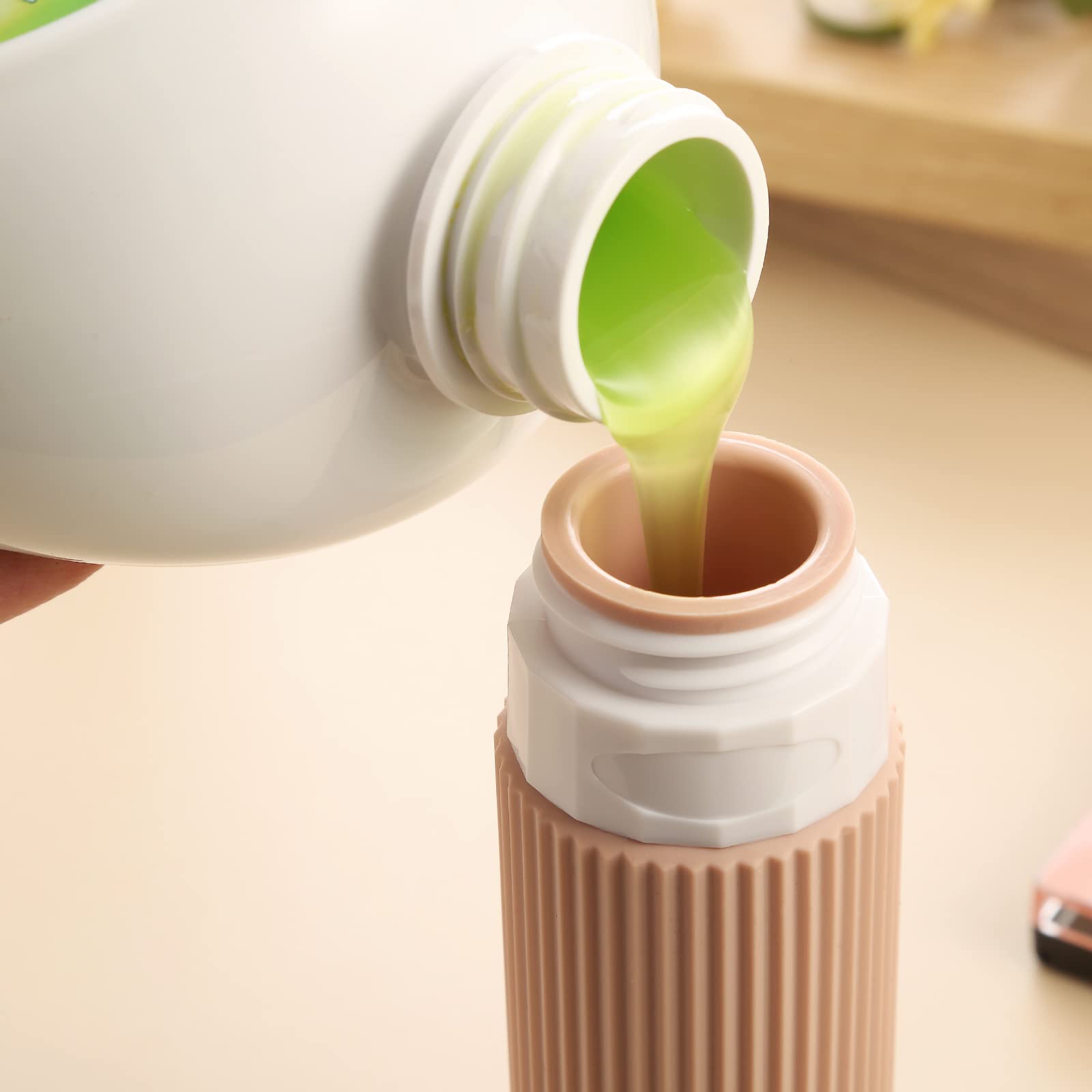 Mrsdry bottle shows no-drip valve to control dispensing