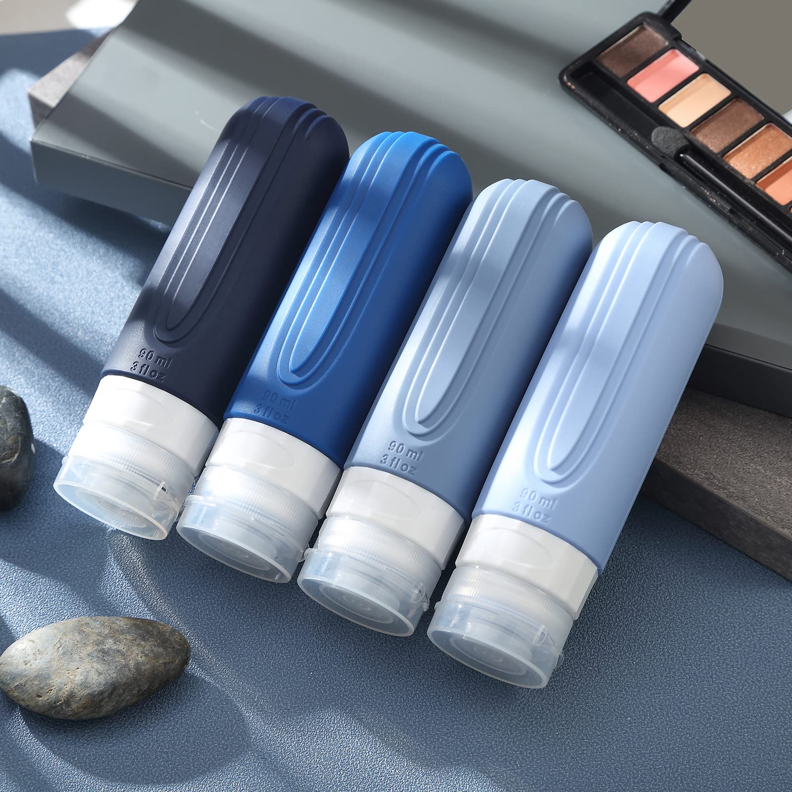 Mrsdry four-pack travel bottles arranged for organization