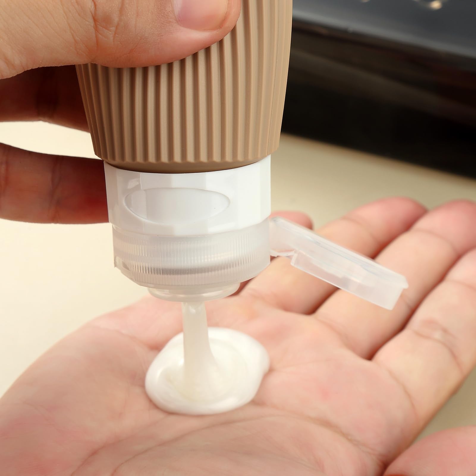 Mrsdry travel bottles feature no-drip valve for precise dispensing and less waste.