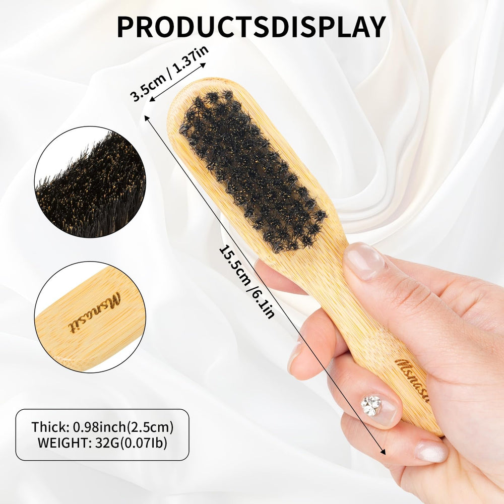 Msnasit mini hair brush in hand, ideal for quick slick-back touchups.
