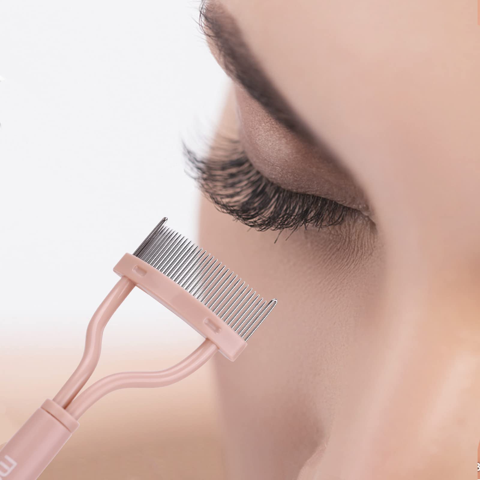 MSQ lash comb with fine teeth for precise clump removal.
