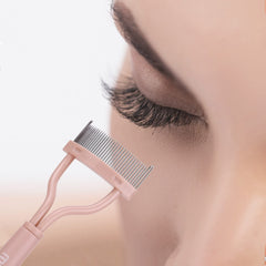 MSQ lash comb with fine teeth for precise clump removal.