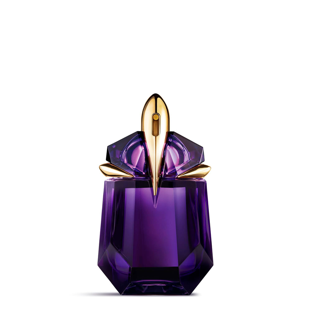 Mugler Alien bottle close-up highlights the luxury design for a premium fragrance moment.