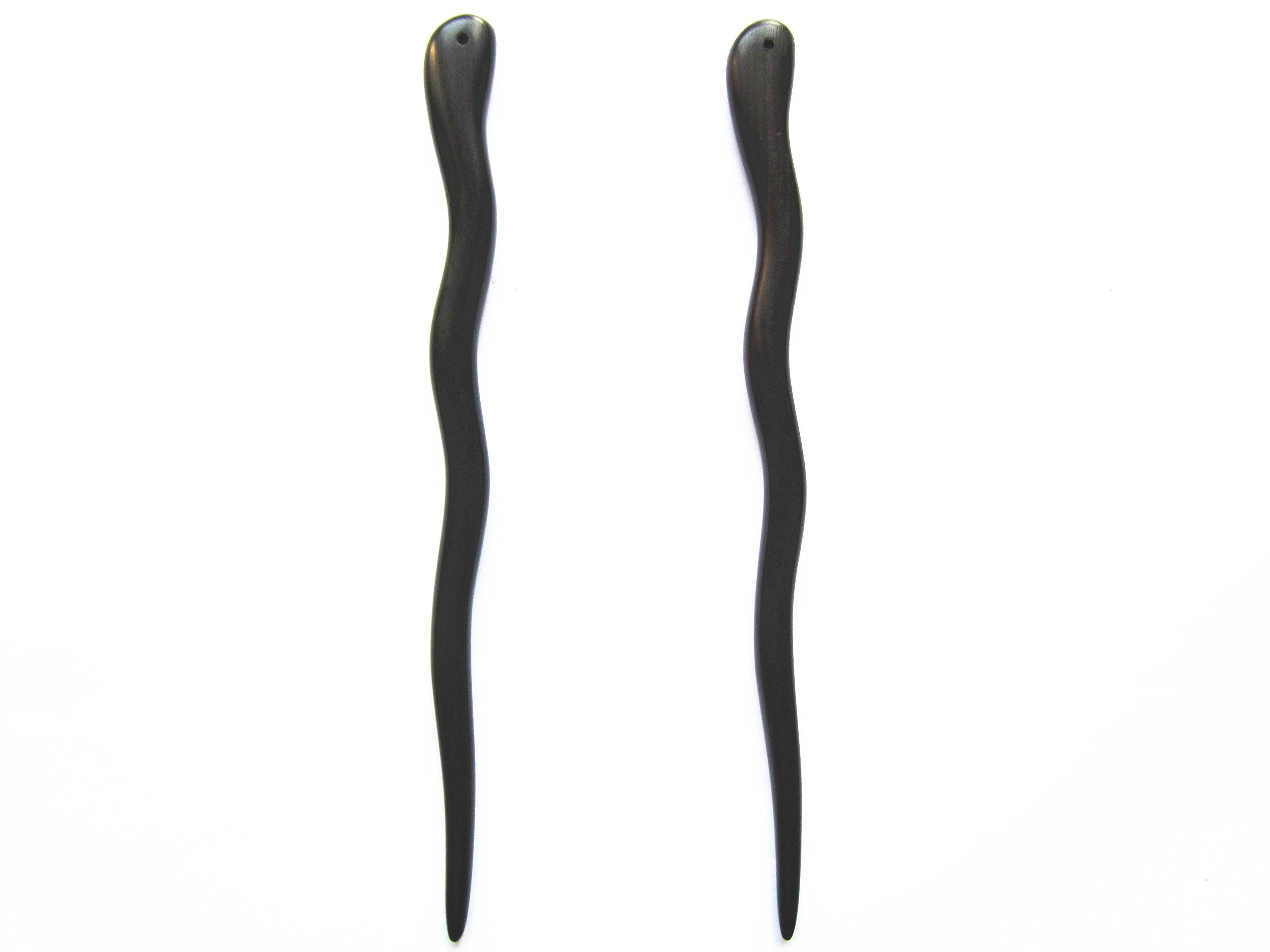 Palillos de ébano natural con fragancia suave para experiencia sensorial agradable.