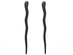 Palillos de ébano natural con fragancia suave para experiencia sensorial agradable.
