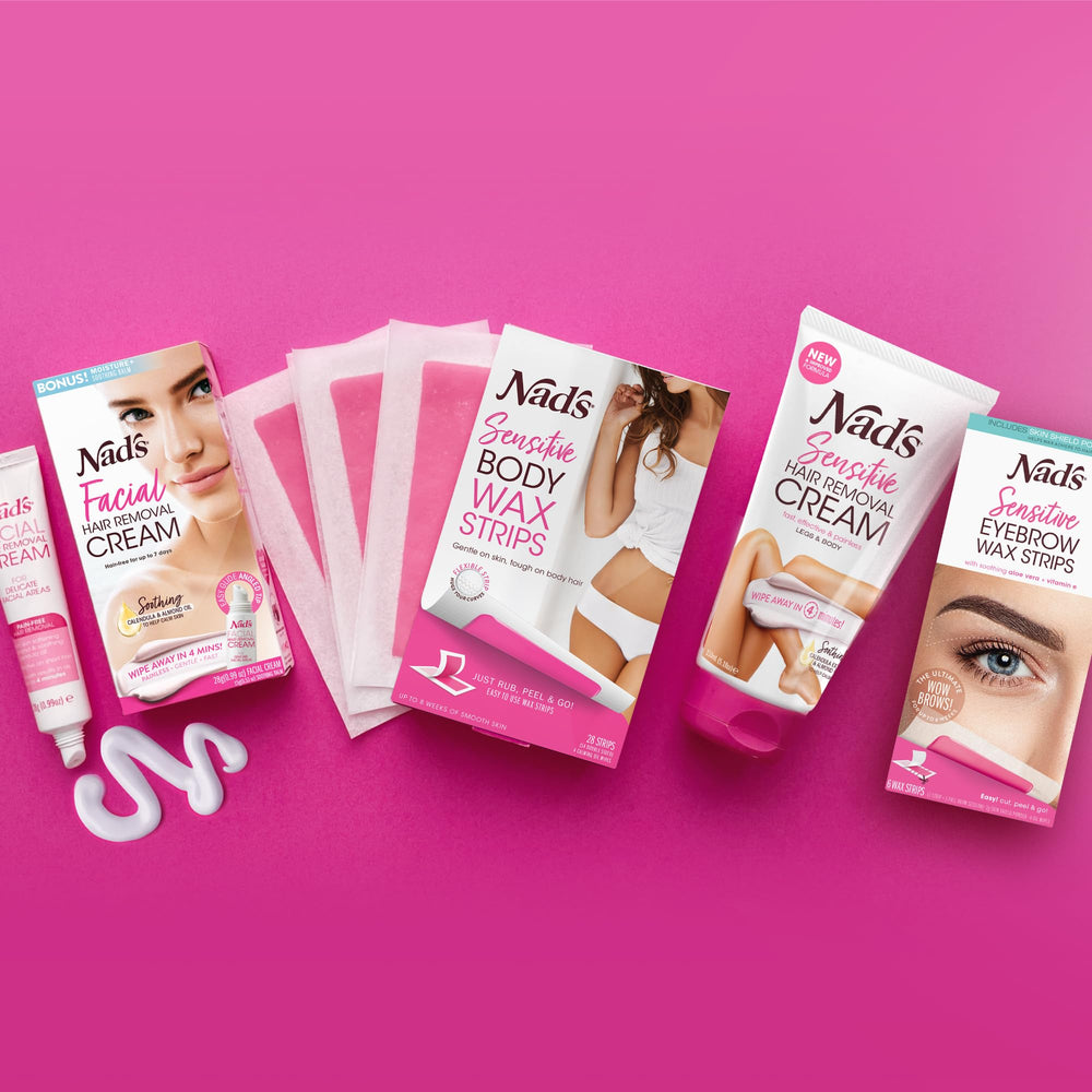 Nad's brow waxing kit close-up showing wax strip in action.