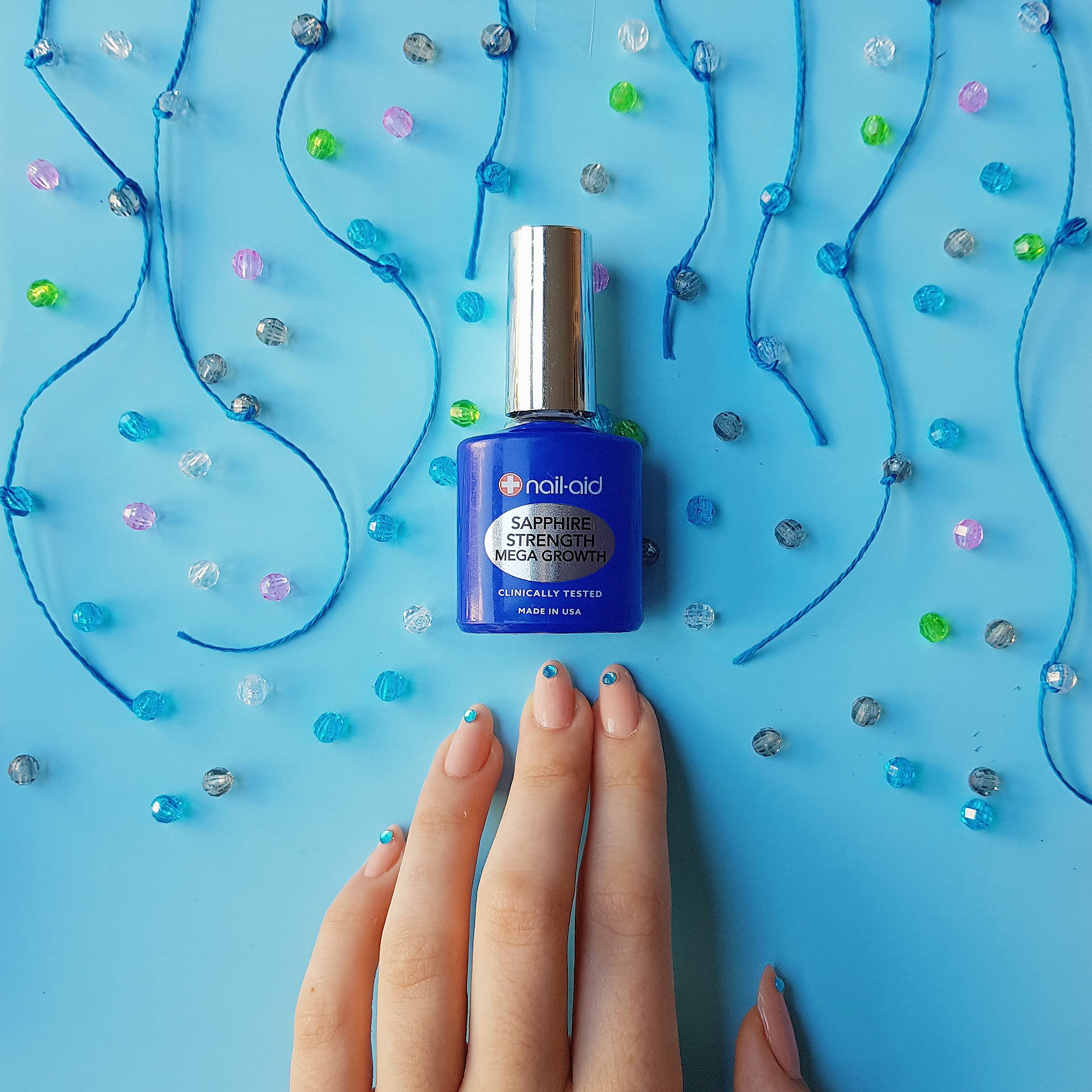 Nail-Aid Sapphire Strengthener: uñas más largas y fortalecidas con uso continuo.
