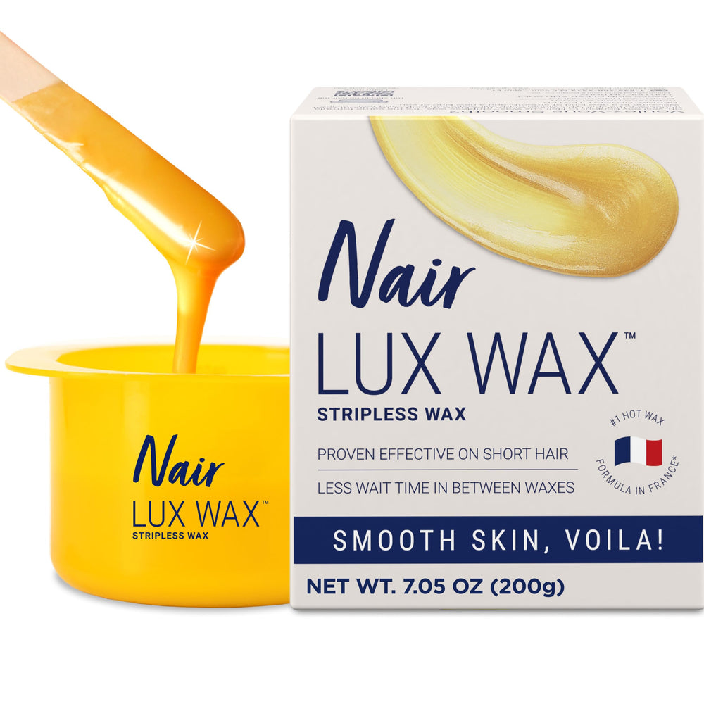 Nair Lux wax pot in microwave heating for at‑home waxing.