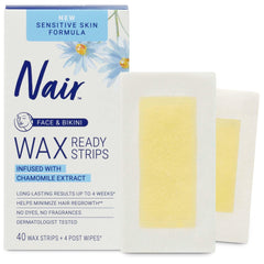 Nair Sensitive Wax Strip being pressed firmly on skin for easy application