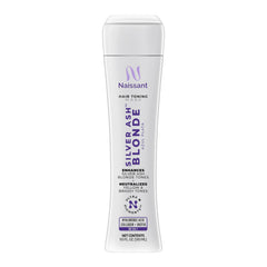 Naissant Silver Ash Blonde mask with blue pigments neutralizes brass for cooler tones.