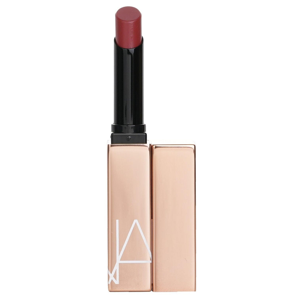 NARS Afterglow Sensual Shine Lipstick Dolce Vita texture close-up showing creamy formula.