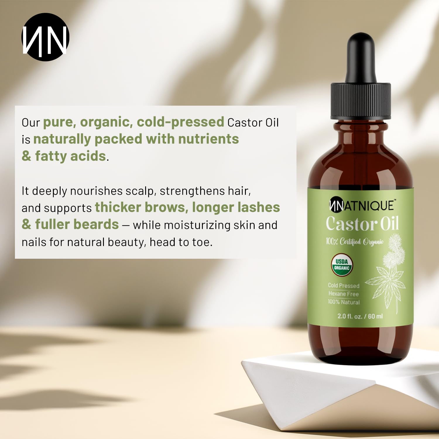 Natnique Castor Oil hair growth use shown on strands and scalp