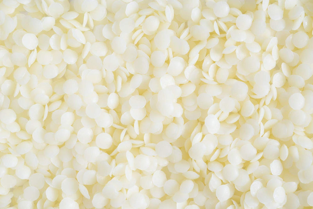 Pastillas emulsificantes Natural Farms NF para emulsiones estables en cremas y lociones.