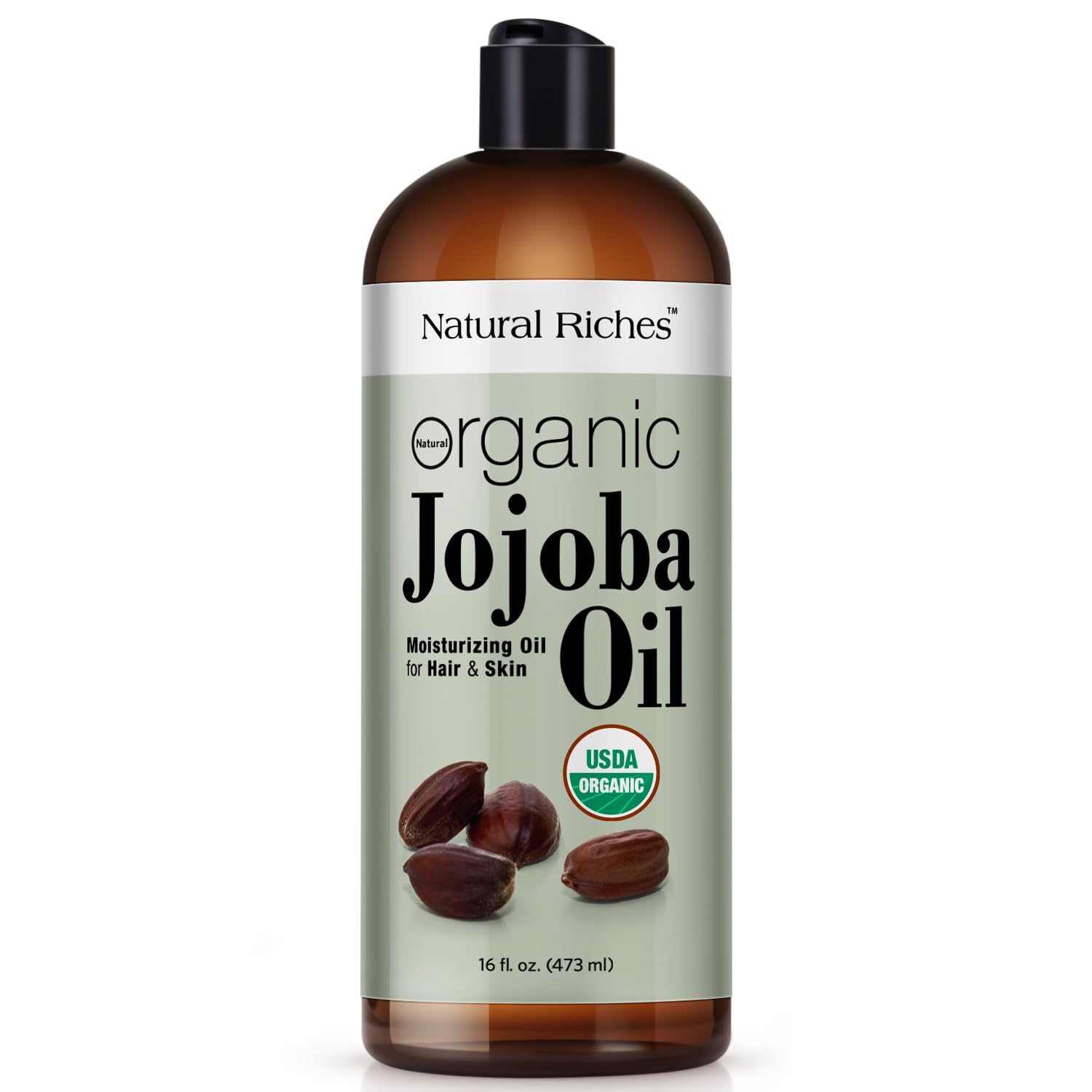 Natural Riches Jojoba Oil bottle closeup shows a pure formula for all skin types.