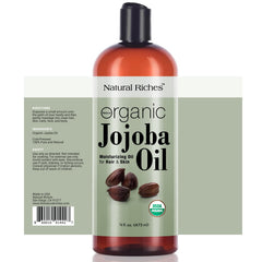 Natural Riches Jojoba Oil bottle pour demonstrates fast absorption for skin and hair.