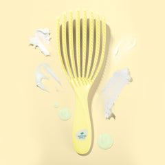 Nature Spell FlexiFlow easy-clean brush removes hair quickly