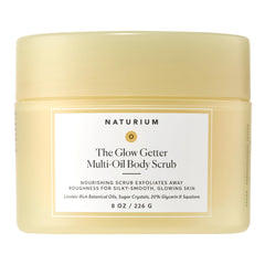 Naturium Glow Getter exfoliante de cuerpo en envase listo para piel suave.