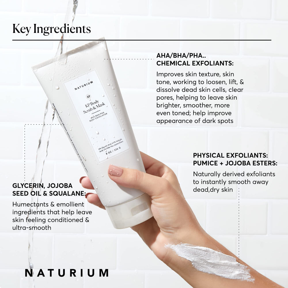 Naturium KP body scrub in shower being massaged for smooth skin.