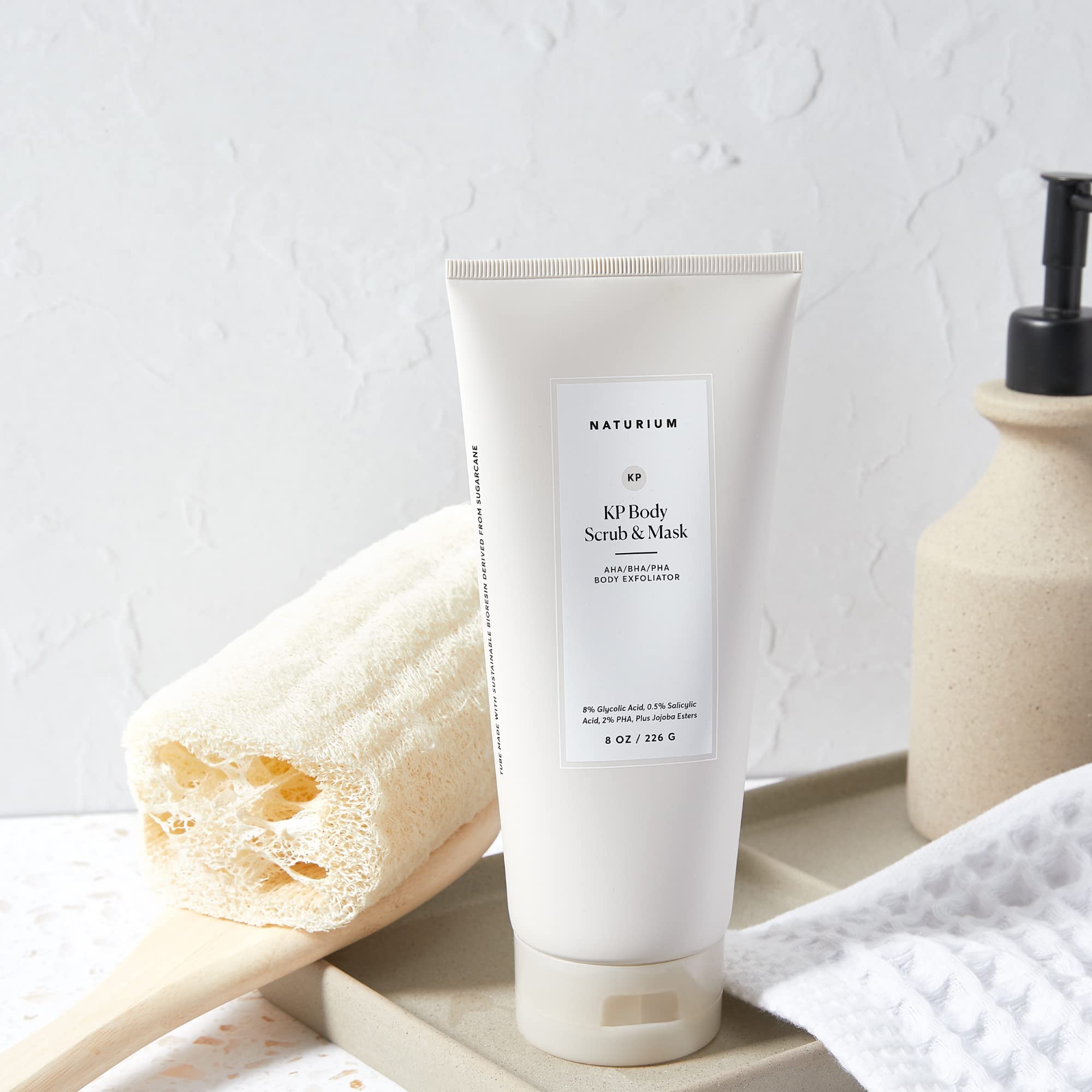 Naturium KP body scrub texture close-up highlighting micro-exfoliants.