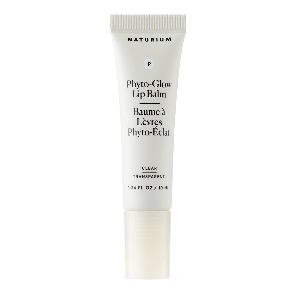 Naturium Phyto-Glow Lip Balm envase claro, hidratación duradera para labios suaves.