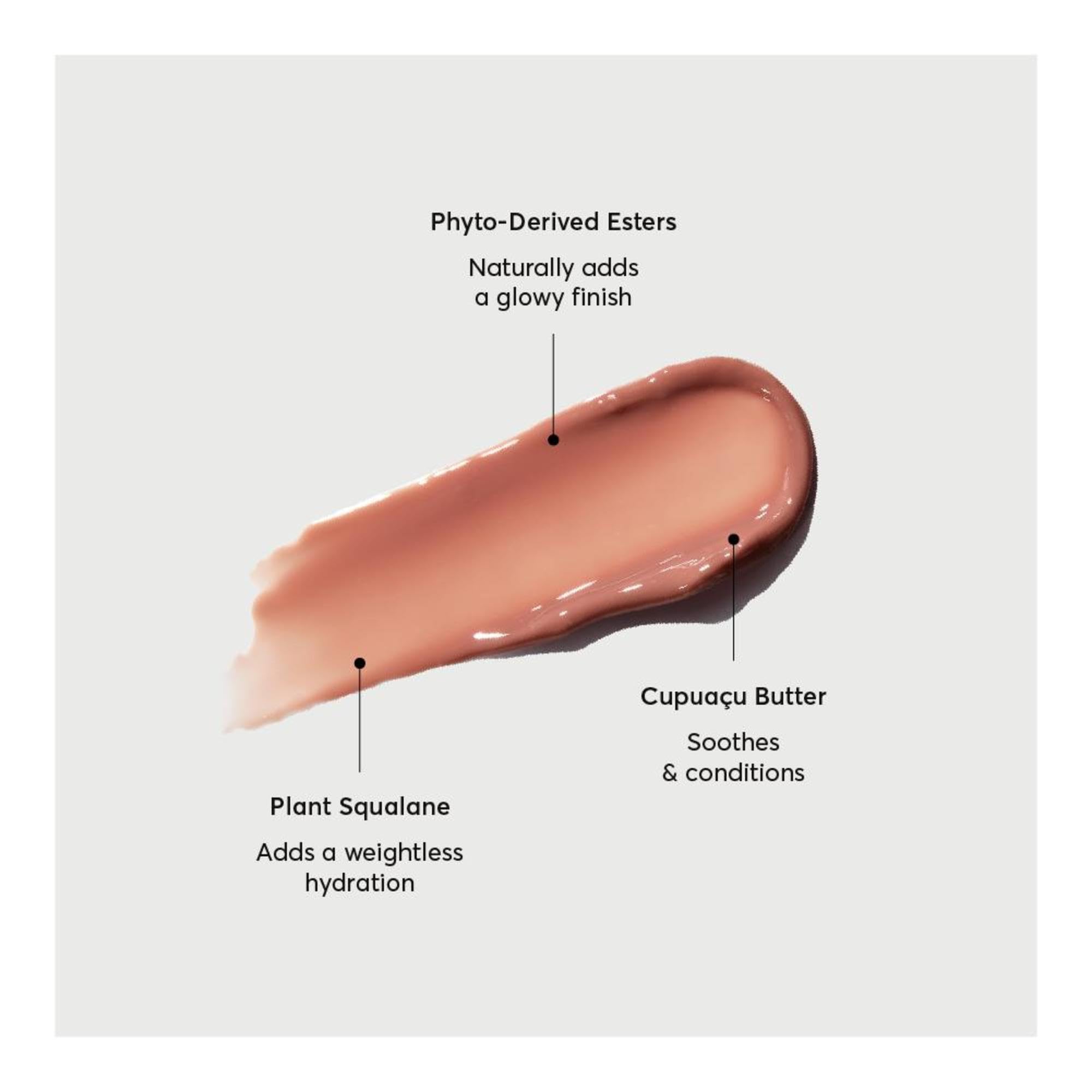 Naturium Phyto-Glow Lip Balm Latte showcases a lacquer-like gloss on lips.