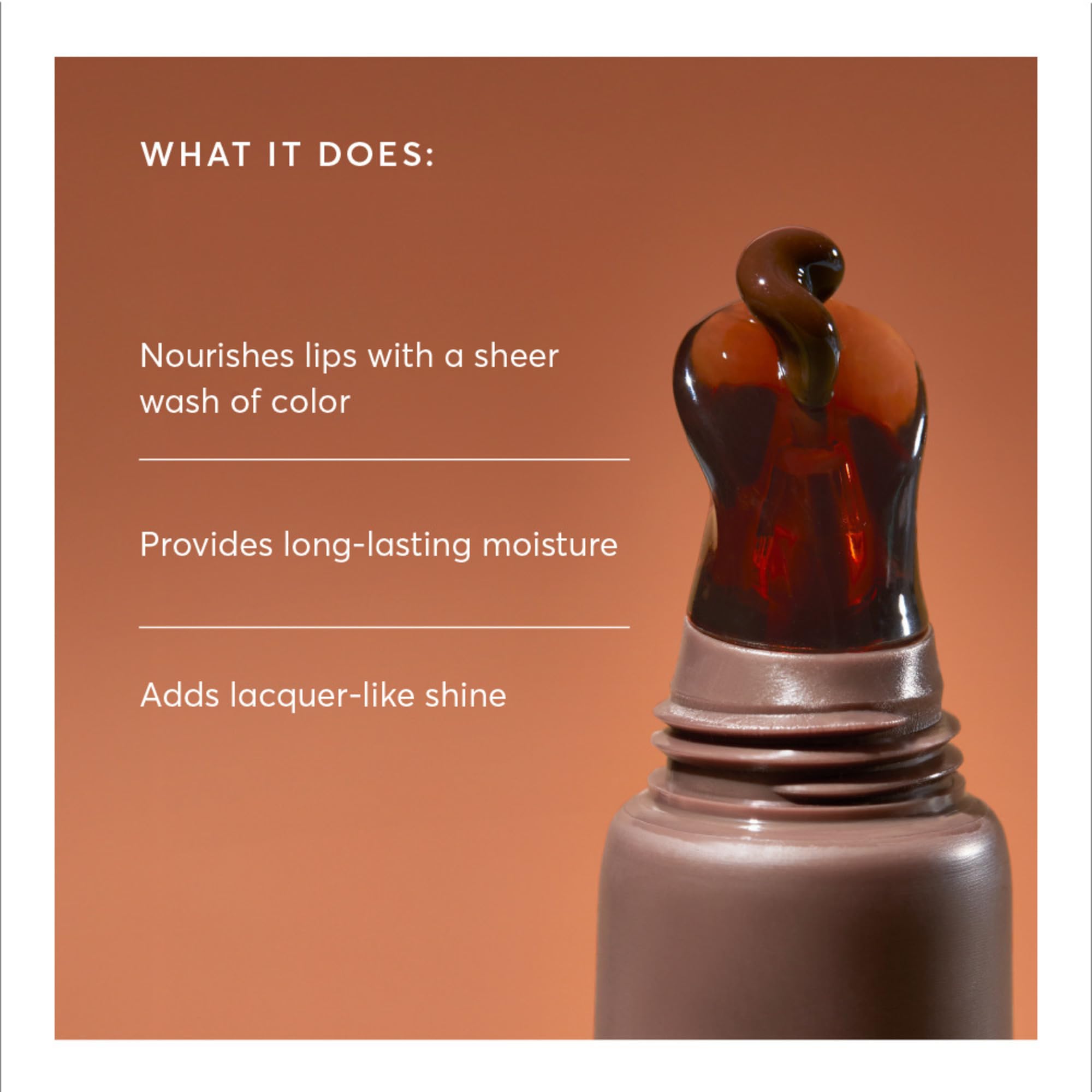 Naturium Phyto-Glow Lip Balm tube close-up showing creamy texture and glossy finish.