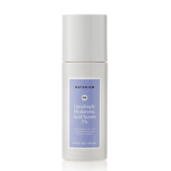 Naturium Quadruple Hyaluronic Acid Serum bottle for hydration and a smoother look.