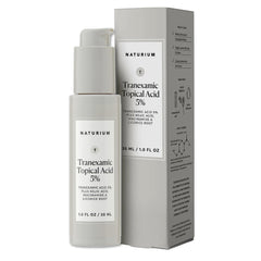 Naturium tranexamic topical acid 5% serum bottle closeup for even-tone skin.