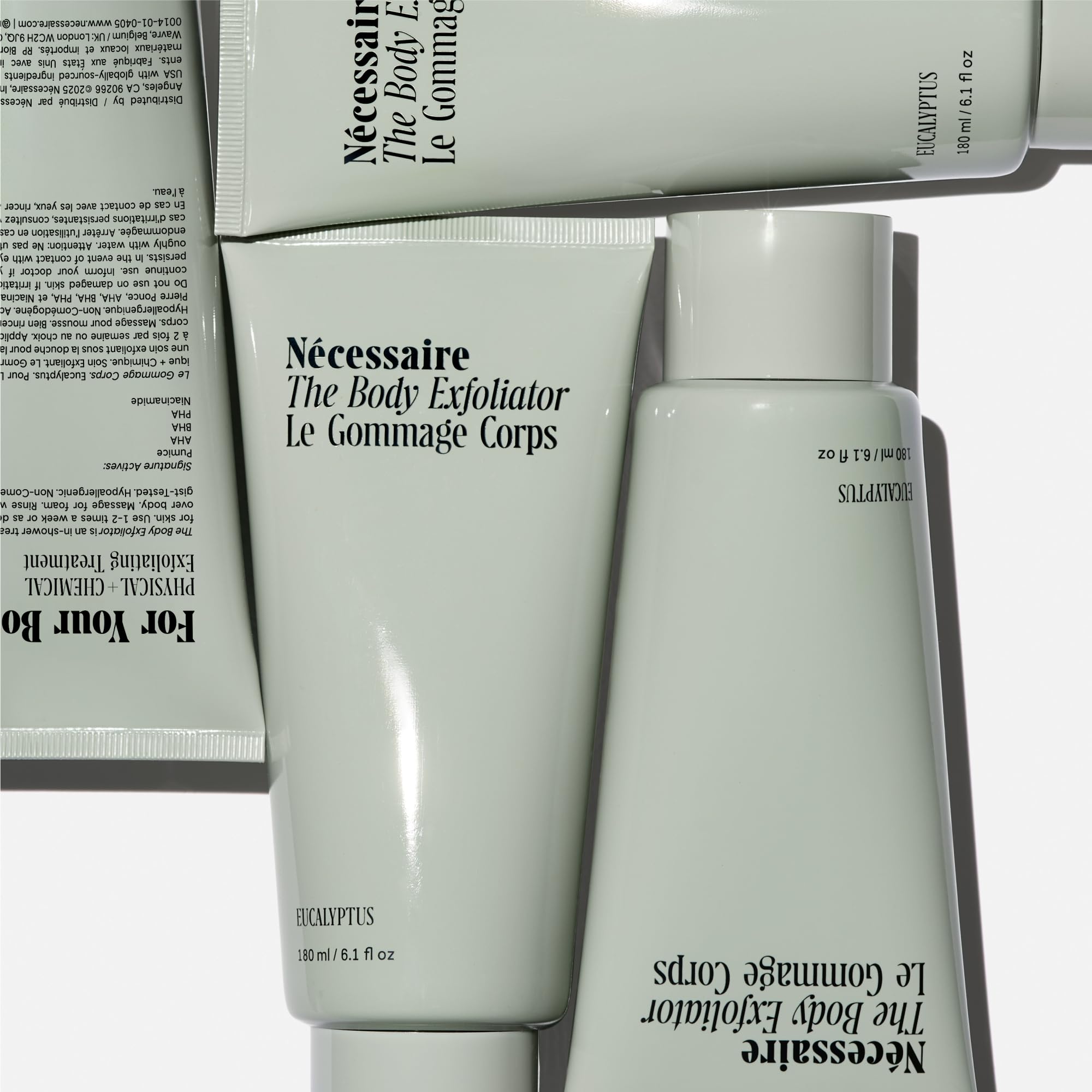 Nécessaire Body Exfoliator volcanic pumice close-up showing physical exfoliation