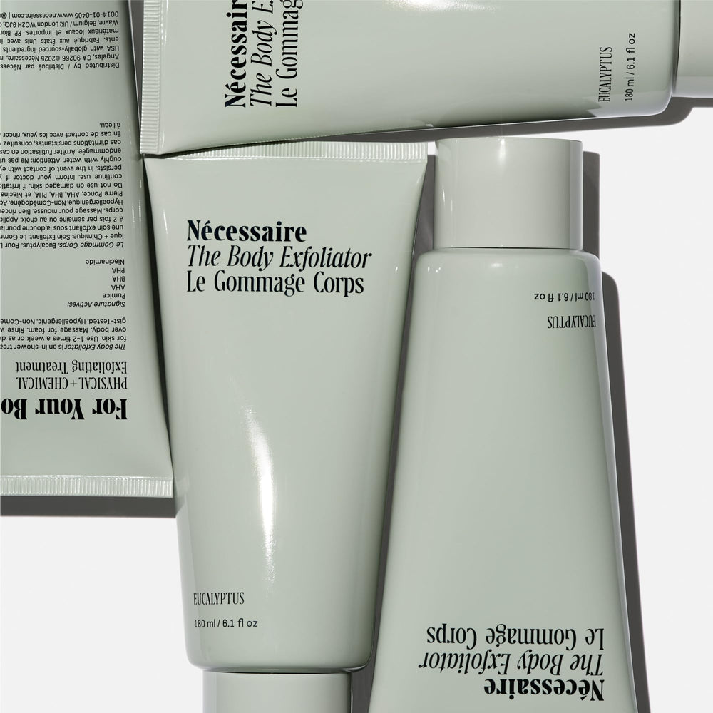 Nécessaire Body Exfoliator volcanic pumice close-up showing physical exfoliation