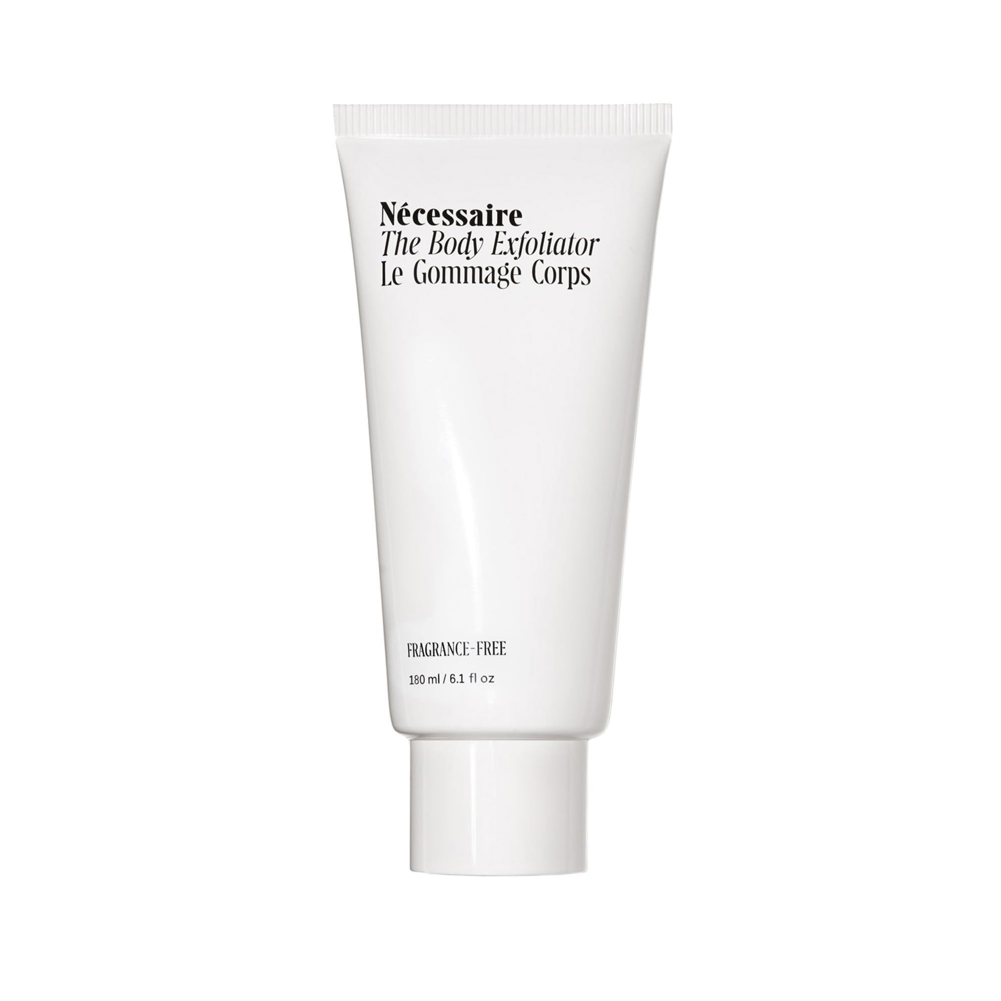 Nécessaire Body Exfoliator close-up shows volcanic pumice for gentle smoothing.