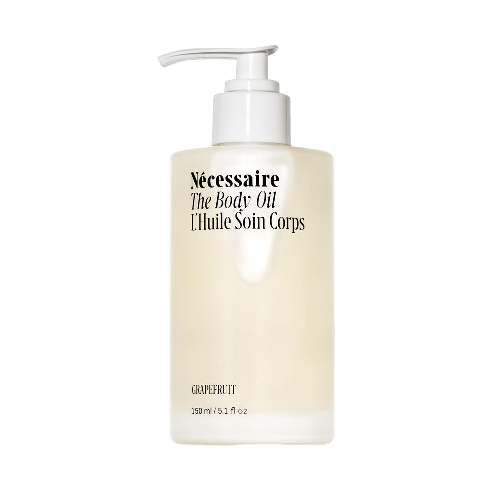 Nécessaire body oil bottle front with multi-nutrient formula for radiant skin